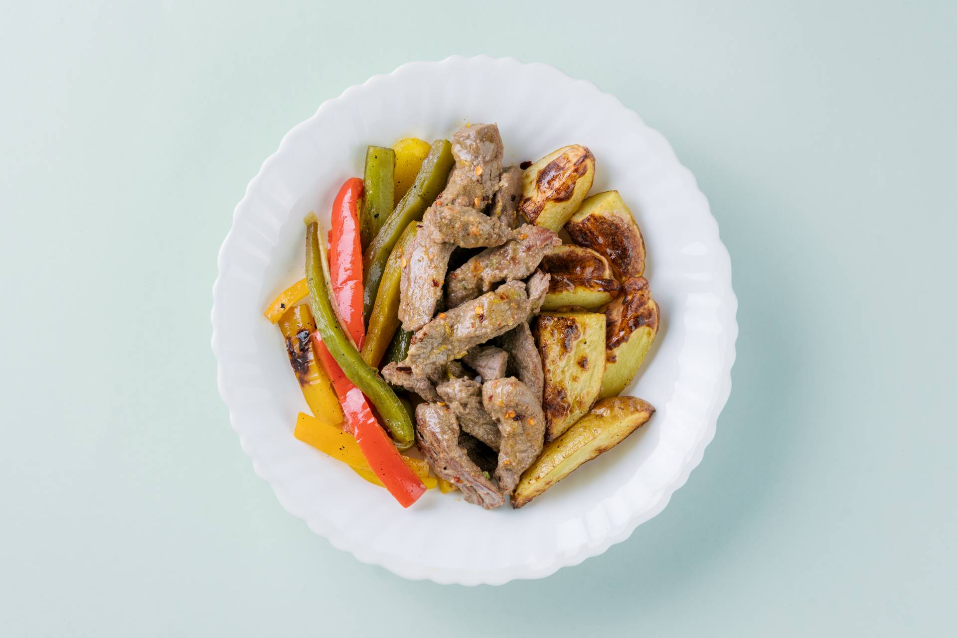 Spicy Orange Beef with potato wedges